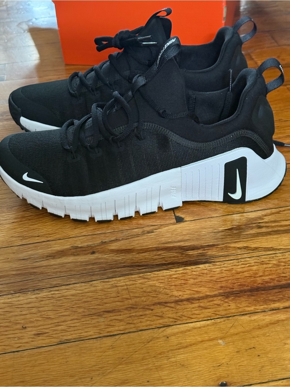 Nike Black and White Slip-On Training Sneakers